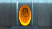 Active Portal spawner with orange portal in it as it appears in Portal